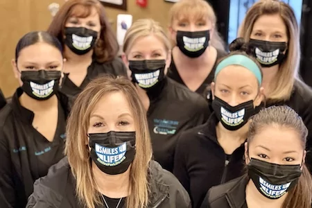Vaca and Kirby staff members wearing surgical masks