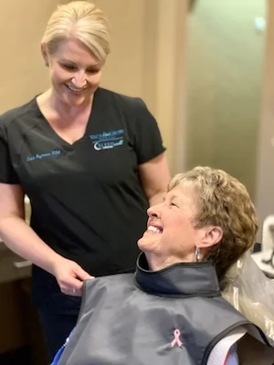 real patient with dental assistant in Longview